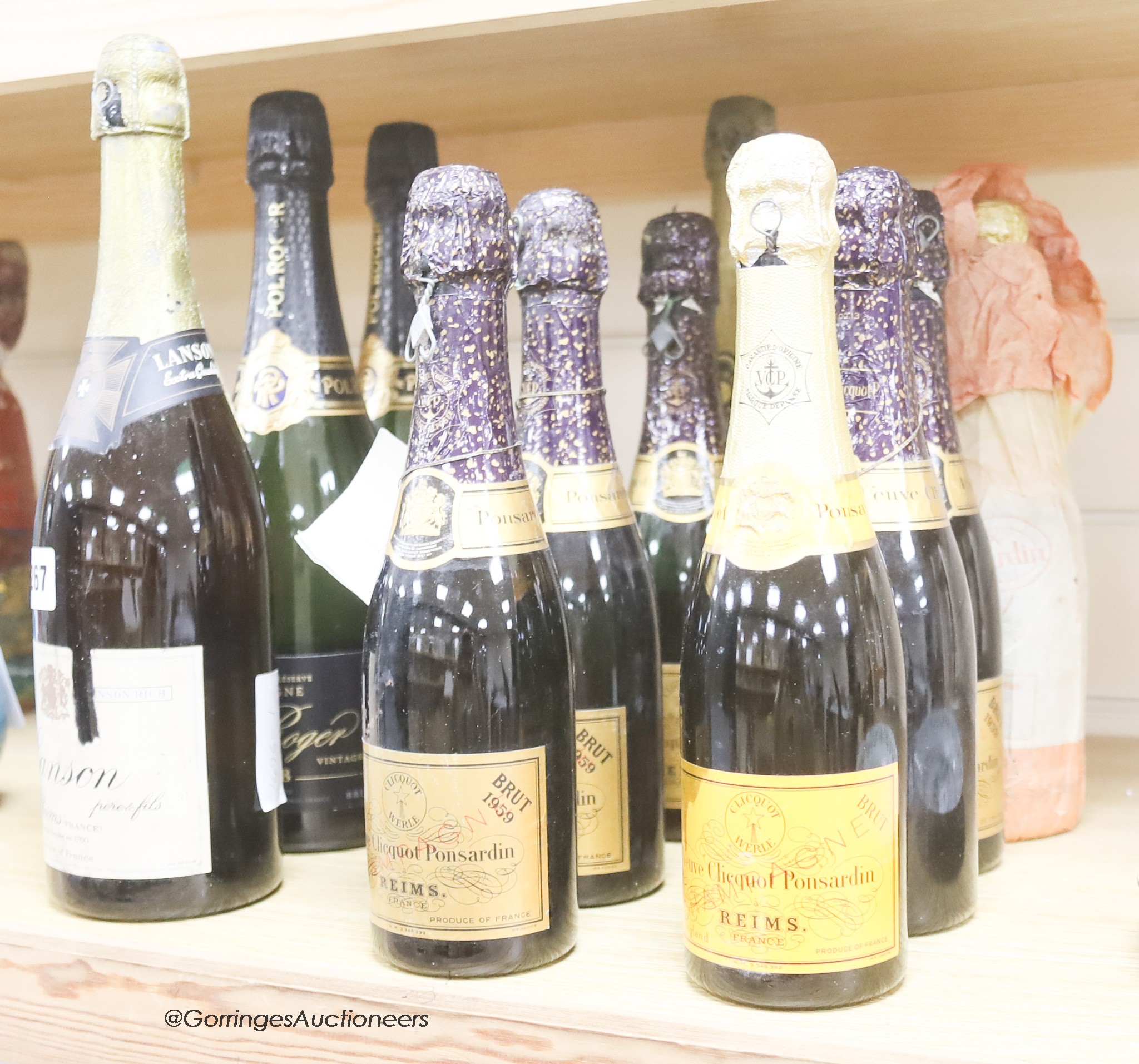 Four assorted champagnes including Bollinger, 1955 and two Pol Roger, 1998 and seven half bottles including five Veuve Cliquot Brut 1959.